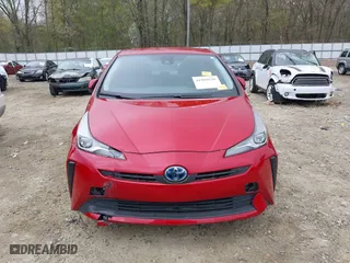 2021 Toyota Prius L Eco with VIN JTDKAMFU6M3134586, listed as a IAAI auction lot 41909538 with 55,355 mi miles. Bid and sale history available at carsss.com. Image 12.