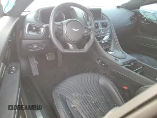 2023 Aston Martin DB11 z VIN SCFRMFAV3PGL11773, wystawiony jako Copart lot #82879093 z przebiegiem Nie podano mil oraz . Historia ofert i sprzedaży dostępna na DreamBid. Obrazek 8.