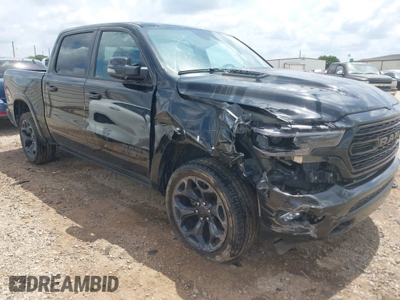 2023 Ram 1500 Limited with VIN 1C6SRFHT6PN541655, listed as a IAAI auction lot 42143725 with 52,793 mi miles and . Bid and sale history available at DreamBid. Image 1.