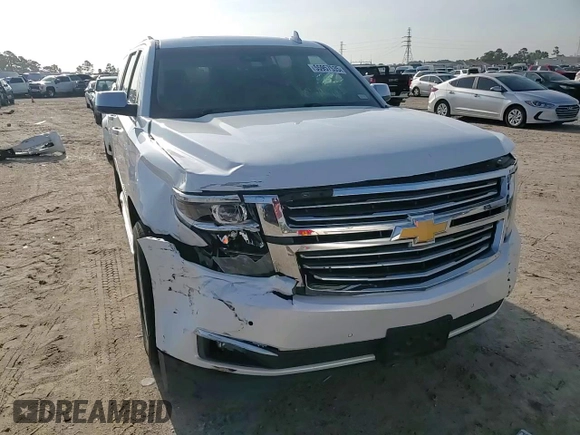2017 Chevrolet Suburban Premier with VIN 1GNSCJKCXHR348044, listed as a Copart auction lot 55957535 with 112,131 mi miles and Salvage title. Bid and sale history available at DreamBid. Image 14.