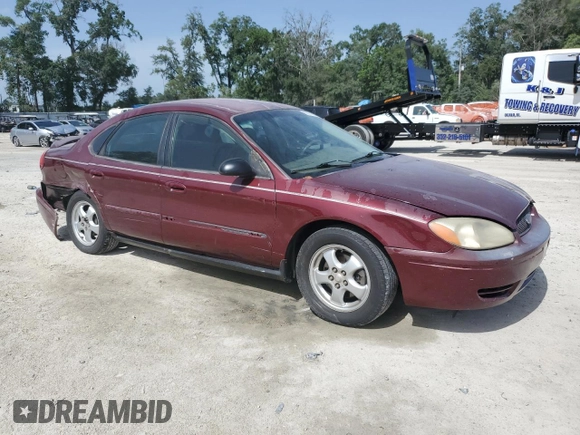 2007 Ford Taurus SE with VIN 1FAFP53U17A151246, listed as a Copart auction lot 60221955 with 284,321 mi miles and Salvage title. Bid and sale history available at DreamBid. Image 4.