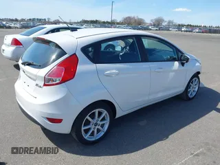2016 Ford Fiesta SE with VIN 3FADP4EJ6GM170303, listed as a IAAI auction lot 42045585 with 121,162 mi miles. Bid and sale history available at carsss.com. Image 4.