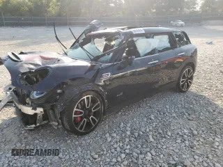 2020 MINI Clubman John Cooper Works with VIN WMWJZ9C04L2L84073, listed as a Copart auction lot 80757794 with 0 mi miles and Salvage Title. Bid and sale history available at carsss.com. Image 1.