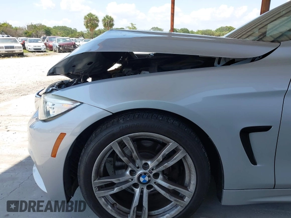 2015 BMW 4 Series 428i with VIN WBA4A5C58FD410076, listed as a IAAI auction lot 39384271 with 125,987 mi miles and . Bid and sale history available at DreamBid. Image 15.
