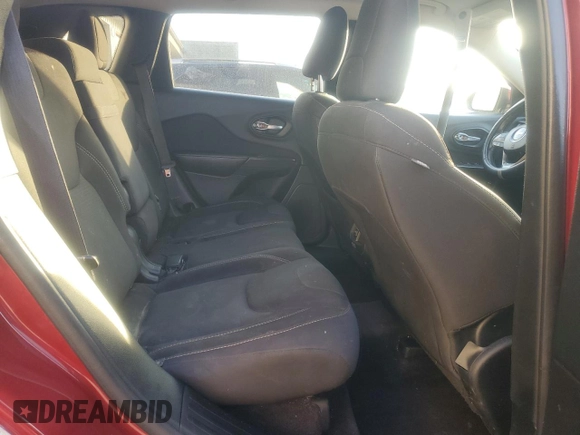 2016 Jeep Cherokee Latitude with VIN 1C4PJLCBXGW221848, listed as a Copart auction lot 51090945 with 216,945 mi miles and Salvage title. Bid and sale history available at DreamBid. Image 12.