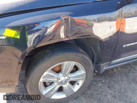 2011 Jeep Compass with VIN 1J4NT1FA4BD208116, listed as a IAAI auction lot 41604552 with 179,633 mi miles. Bid and sale history available at carsss.com. Image 6.