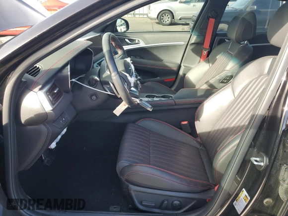 2023 Genesis G70 2.0T with VIN KMTG34TA5PU132838, listed as a Copart auction lot 85335444 with 5,970 mi miles and Salvage Title. Bid and sale history available at DreamBid. Image 7.