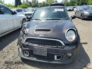 2013 MINI Convertible S with VIN WMWZP3C51DT551373, listed as a Copart auction lot 57878745 with 110,181 mi miles and Salvage title. Bid and sale history available at DreamBid. Image 5.