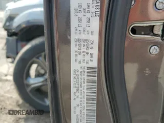 2015 Dodge Journey Crossroad with VIN 3C4PDDGG7FT676017, listed as a Copart auction lot 61740615 with 111,267 mi miles and Salvage title. Bid and sale history available at DreamBid. Image 13.