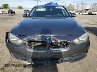 2016 BMW 3 Series 320i with VIN WBA8A9C53GK618159, listed as a Copart auction lot 50222555 with 143,007 mi miles and Salvage Title. Bid and sale history available at carsss.com. Image 5.