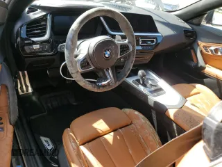 2024 BMW Z4 sDriveM40i with VIN WBAHF9C02RWY35106, listed as a Copart auction lot 76471014 with 0 mi miles and Salvage Title. Bid and sale history available at carsss.com. Image 8.