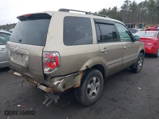 2006 Honda Pilot EX-L with RES with VIN 2HKYF18656H526846, listed as a IAAI auction lot 41737028 with 398,622 mi miles. Bid and sale history available at carsss.com. Image 4.