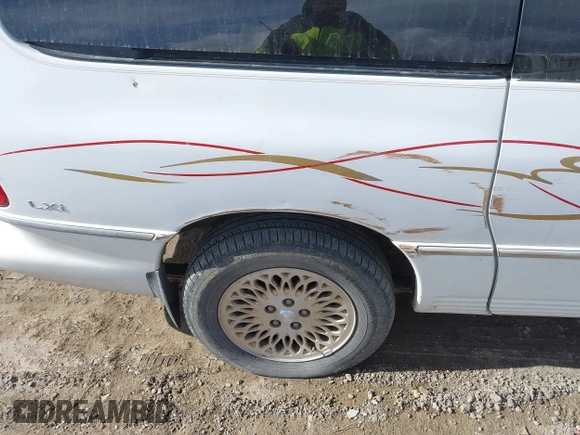 1997 Chrysler Town & Country with VIN 1C4GT64L7VB436658, listed as a IAAI auction lot 41823587 with 184,570 mi miles and . Bid and sale history available at DreamBid. Image 6.