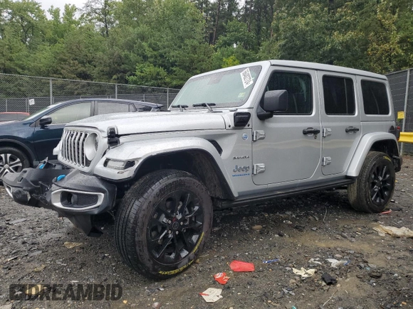 2024 Jeep Wrangler Sahara with VIN 1C4RJXP65RW210689, listed as a Copart auction lot 66482724 with 4,872 mi miles and Salvage Title. Bid and sale history available at DreamBid. Image 1.