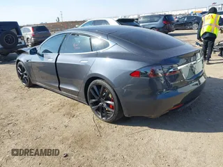 2018 Tesla Model S 75D with VIN 5YJSA1E49JF294699, listed as a IAAI auction lot 41567770 with 34,644 mi miles and . Bid and sale history available at DreamBid. Image 3.