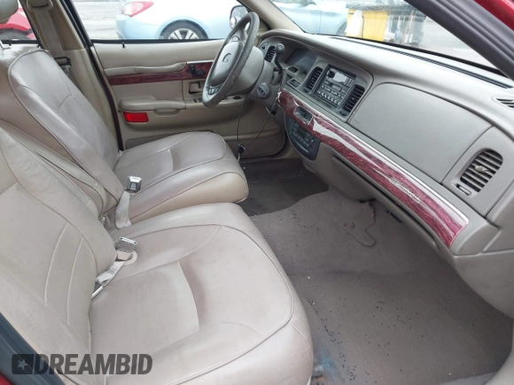 2000 Mercury Grand Marquis LS z VIN 2MEFM75W0YX658319, wystawiony jako IAAI lot #42028736 z przebiegiem 154 651 mil mil oraz . Historia ofert i sprzedaży dostępna na DreamBid. Obrazek 5.