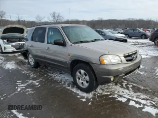 2001 Mazda Tribute LX with VIN 4F2CU081X1KM70119, listed as a Copart auction lot 89311935 with 176,851 mi miles and Salvage Title. Bid and sale history available at DreamBid. Image 4.