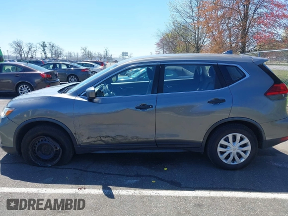 2017 Nissan Rogue S with VIN JN8AT2MV1HW013821, listed as a IAAI auction lot 42063877 with 100,025 mi miles. Bid and sale history available at carsss.com. Image 6.