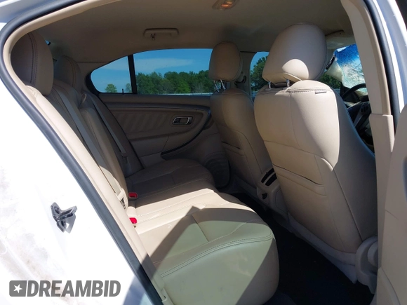 2013 Ford Taurus SEL with VIN 1FAHP2E80DG179961, listed as a IAAI auction lot 42088532 with 131,196 mi miles and . Bid and sale history available at carsss.com. Image 8.