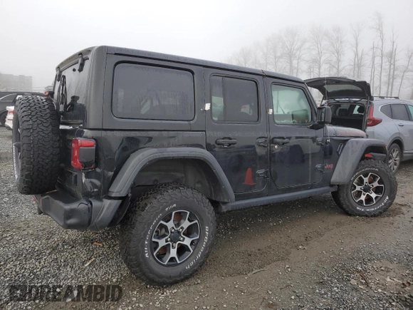 2021 Jeep Wrangler Unlimited Rubicon with VIN 1C4JJXFM7MW818199, listed as a Copart auction lot 87428474 with 18,696 mi miles and Salvage Title. Bid and sale history available at carsss.com. Image 3.