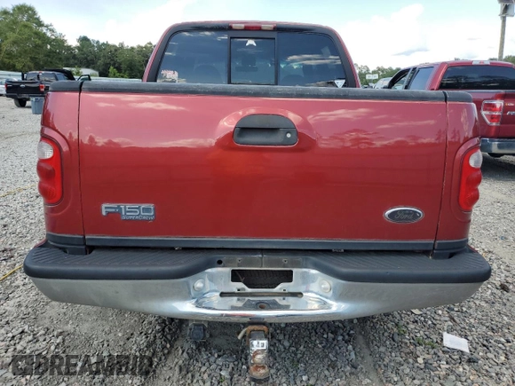 2001 Ford F-150 XLT with VIN 1FTRW07LX1KD65474, listed as a Copart auction lot 61474655 with 361,023 mi miles and Salvage title. Bid and sale history available at DreamBid. Image 6.