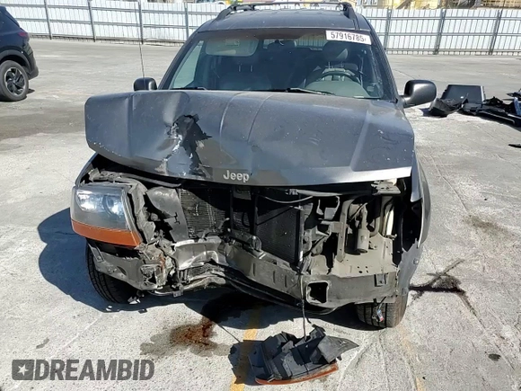 2000 Jeep Grand Cherokee Laredo with VIN 1J4G248S2YC377133, listed as a Copart auction lot 57916785 with 217,525 mi miles and Salvage title. Bid and sale history available at DreamBid. Image 14.