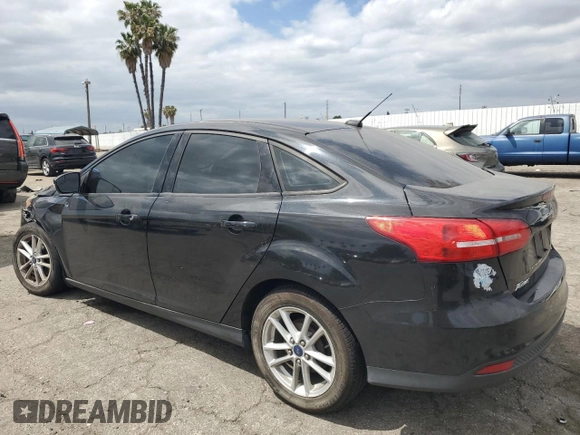 2015 Ford Focus SE with VIN 1FADP3F20FL249872, listed as a Copart auction lot 53506885 with 97,078 mi miles and Salvage title. Bid and sale history available at DreamBid. Image 2.