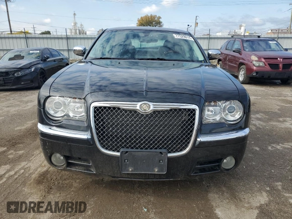 2009 Chrysler 300 with VIN 2C3LK33V19H614083, listed as a Copart auction lot 77529014 with 188,125 mi miles and Salvage title. Bid and sale history available at DreamBid. Image 5.