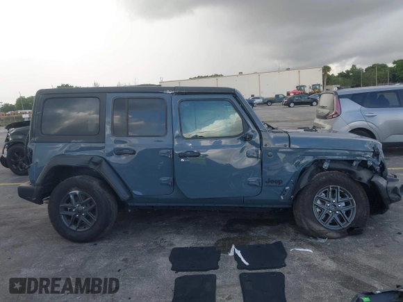 2024 Jeep Wrangler Sport S with VIN 1C4PJXDN8RW370133, listed as a IAAI auction lot 42453029 with 10,415 mi miles and . Bid and sale history available at DreamBid. Image 14.