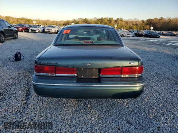 1996 Ford Crown Victoria LX z VIN 2FALP74W0TX205507, wystawiony jako Copart lot #85310874 z przebiegiem 51 646 mil mil oraz Szkoda całkowita • Salvage title. Historia ofert i sprzedaży dostępna na DreamBid. Obrazek 6.