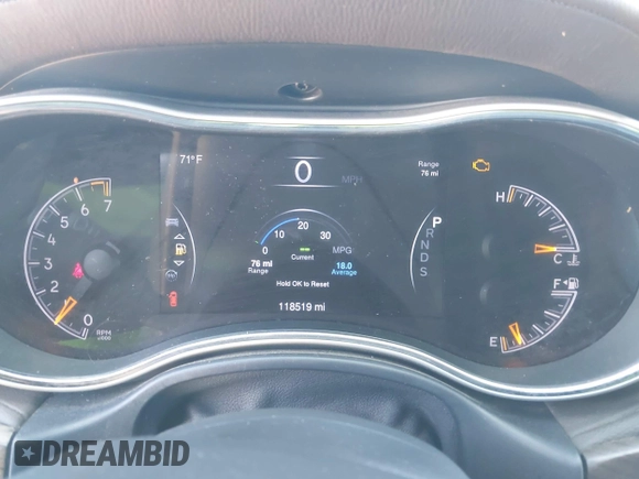 2015 Jeep Grand Cherokee Overland with VIN 1C4RJECG3FC635327, listed as a IAAI auction lot 41910559 with 118,519 mi miles and . Bid and sale history available at DreamBid. Image 7.