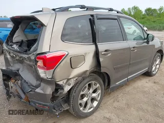 2017 Subaru Forester Touring z VIN JF2SJAWC6HH529707, wystawiony jako IAAI lot #42401138 z przebiegiem 172 868 mil mil oraz . Historia ofert i sprzedaży dostępna na DreamBid. Obrazek 4.