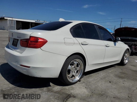 2014 BMW 3 Series 328i with VIN WBA3C1C56EK108374, listed as a Copart auction lot 52902485 with 136,407 mi miles and Salvage Title. Bid and sale history available at carsss.com. Image 3.
