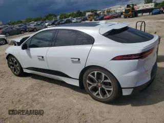 2020 Jaguar I-Pace SE z VIN SADHC2S10L1F87320, wystawiony jako Copart lot #68242673 z przebiegiem 48 264 mil mil oraz . Historia ofert i sprzedaży dostępna na DreamBid. Obrazek 2.