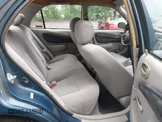 2000 Chevrolet Prizm LSi z VIN 1Y1SK5289YZ401584, wystawiony jako IAAI lot #42263210 z przebiegiem 151 567 mil mil oraz . Historia ofert i sprzedaży dostępna na DreamBid. Obrazek 8.