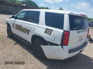 2020 Chevrolet Tahoe Commercial with VIN 1GNLCDECXLR154849, listed as a IAAI auction lot 42050778 with 124,771 mi miles and . Bid and sale history available at DreamBid. Image 3.