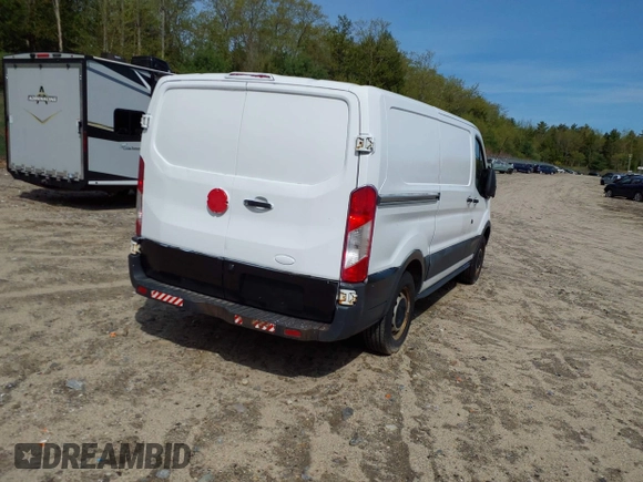 2016 Ford Transit Cargo with VIN 1FTYE1YM0GKB19151, listed as a IAAI auction lot 42029234 with 240,441 mi miles and . Bid and sale history available at DreamBid. Image 4.