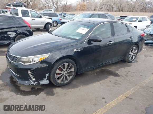 2016 Kia Optima SX Turbo with VIN 5XXGW4L2XGG052746, listed as a IAAI auction lot 41306792 with 69,571 mi miles and . Bid and sale history available at carsss.com. Image 17.