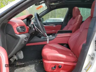 2020 Maserati Levante S z VIN ZN661YUS4LX353935, wystawiony jako Copart lot #52856194 z przebiegiem 36 118 mil mil oraz Czysty tytuł • Clean title. Historia ofert i sprzedaży dostępna na DreamBid. Obrazek 7.