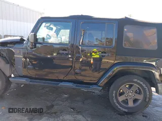 2016 Jeep Wrangler Unlimited Sport with VIN 1C4BJWDG1GL226069, listed as a IAAI auction lot 41003276 with 88,015 mi miles and . Bid and sale history available at DreamBid. Image 14.