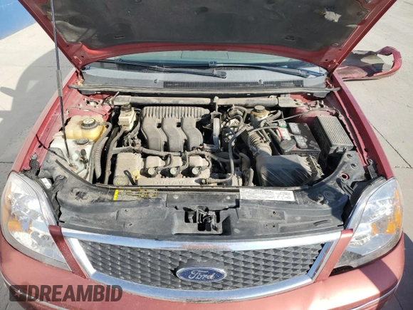 2005 Ford Five Hundred SE with VIN 1FAFP23115G159622, listed as a Copart auction lot 70700344 with 159,788 mi miles and Salvage Title. Bid and sale history available at carsss.com. Image 11.