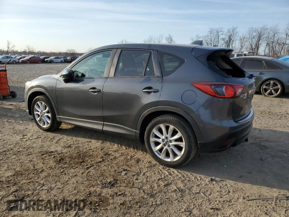 2014 Mazda CX-5 Grand Touring with VIN JM3KE4DY5E0372787, listed as a Copart auction lot 48873675 with 136,784 mi miles and Salvage Title. Bid and sale history available at carsss.com. Image 2.
