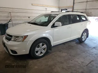 2012 Dodge Journey SXT z VIN 3C4PDDBG1CT258233, wystawiony jako Copart lot #56713635 z przebiegiem 164 975 mil mil oraz Szkoda całkowita • Salvage title. Historia ofert i sprzedaży dostępna na DreamBid. Obrazek 1.