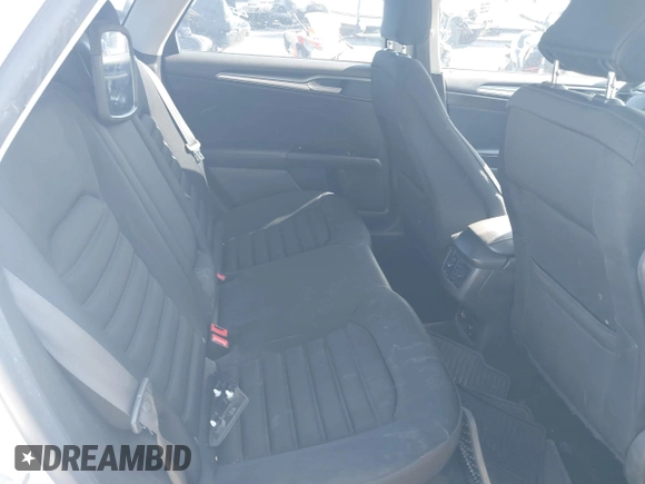 2016 Ford Fusion SE Hybrid with VIN 3FA6P0LU1GR385184, listed as a IAAI auction lot 39230513 with 106,311 mi miles. Bid and sale history available at carsss.com. Image 8.