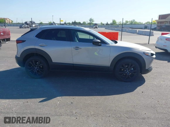 2024 Mazda CX-30 2.5 S Select Sport with VIN 3MVDMBBM4RM689518, listed as a IAAI auction lot 42021872 with 5,041 mi miles. Bid and sale history available at carsss.com. Image 13.