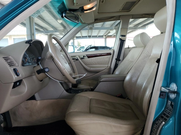 1998 Mercedes-Benz C-Class with VIN WDBHA29G2WA587752, listed as a Copart auction lot 49995535 with 222,264 mi miles and Salvage Title. Bid and sale history available at carsss.com. Image 7.