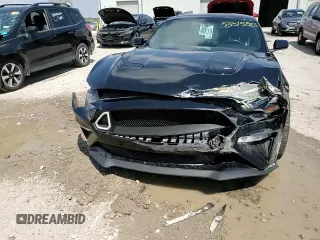 2018 Ford Mustang GT z VIN 1FA6P8CF4J5106417, wystawiony jako Copart lot #53315025 z przebiegiem 61 852 mil mil oraz Szkoda całkowita • Salvage title. Historia ofert i sprzedaży dostępna na DreamBid. Obrazek 11.