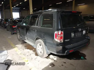 2007 Honda Pilot EX-L with VIN 2HKYF18647H504953, listed as a IAAI auction lot 41750435 with 186,097 mi miles and . Bid and sale history available at DreamBid. Image 3.