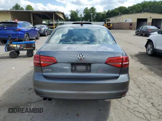 2015 Volkswagen Jetta S with VIN 3VW2K7AJ5FM327788, listed as a Copart auction lot 64034985 with 43,172 mi miles and Salvage title. Bid and sale history available at DreamBid. Image 6.