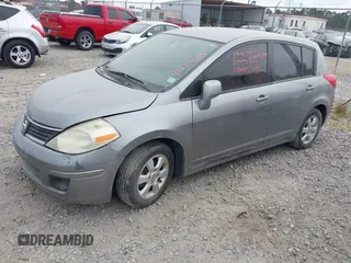 2009 Nissan Versa S with VIN 3N1BC13E99L390449, listed as a IAAI auction lot 42129663 with 129,066 mi miles and . Bid and sale history available at DreamBid. Image 2.